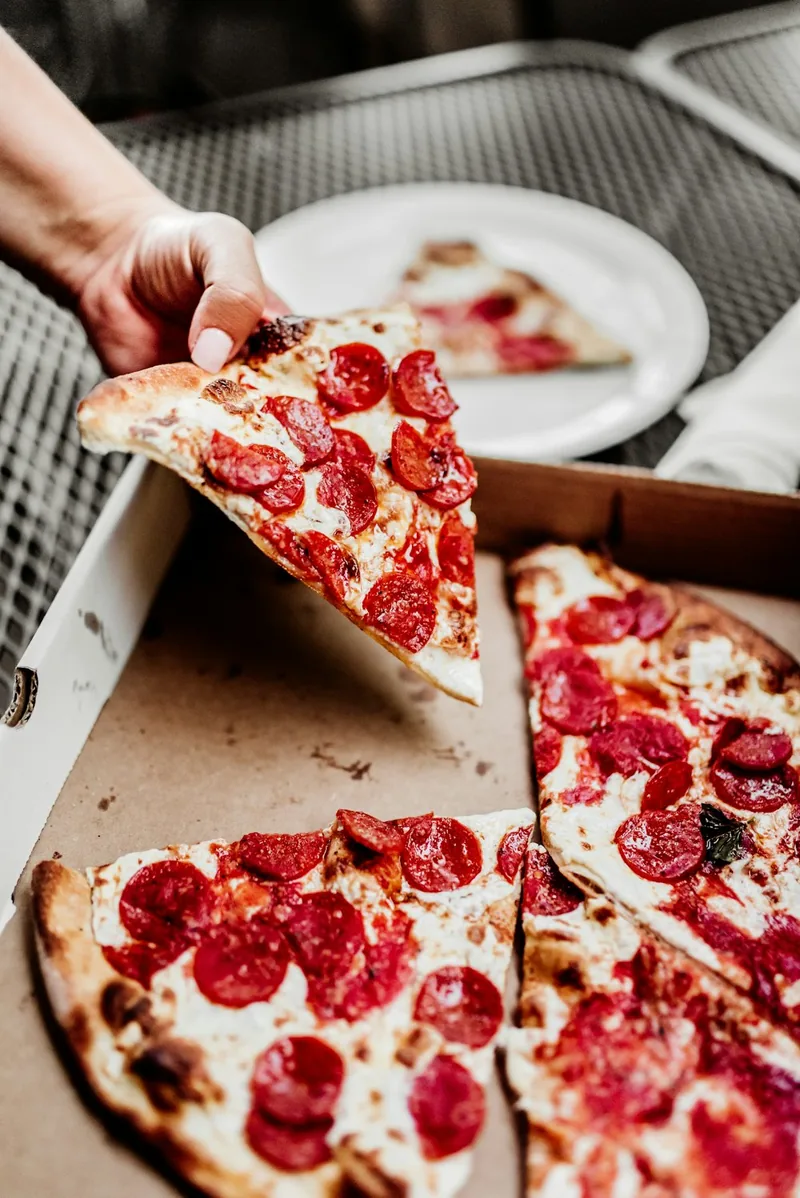 A pepperoni slice with crisped cupping pepperoni