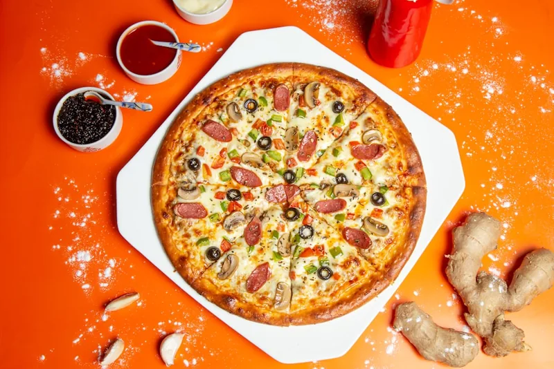 A loaded pizza fresh out of the oven