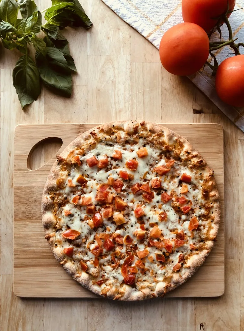 A white pie with ricotta dollops